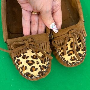 Minnetonka brown leather moccasins with animal print calf hair